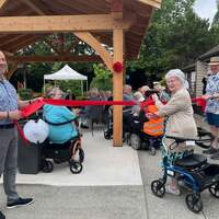 Cutting the official red ribbon